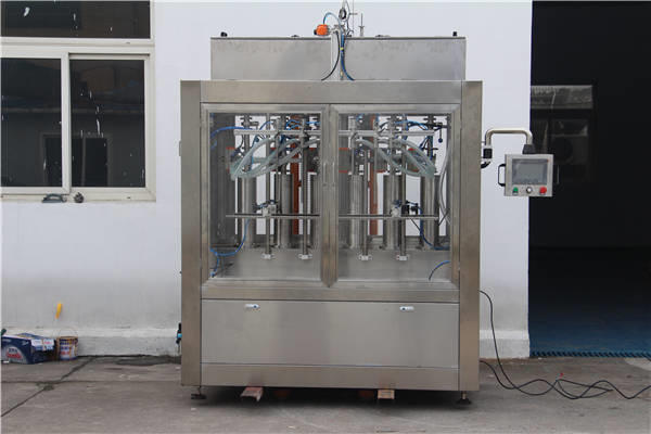 Автоматическая машина для наполнения джем-бутылок